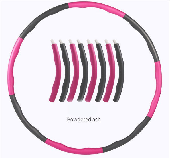 Fitness ring for exercise ve růžové a šedé barvě, skládací cvičební hoop pro aktivní trénink.