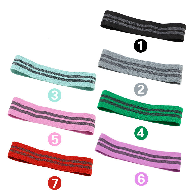 Barevné fitness squat resistance band z polyesteru a latexu, ideální pro cvičení a posilování.