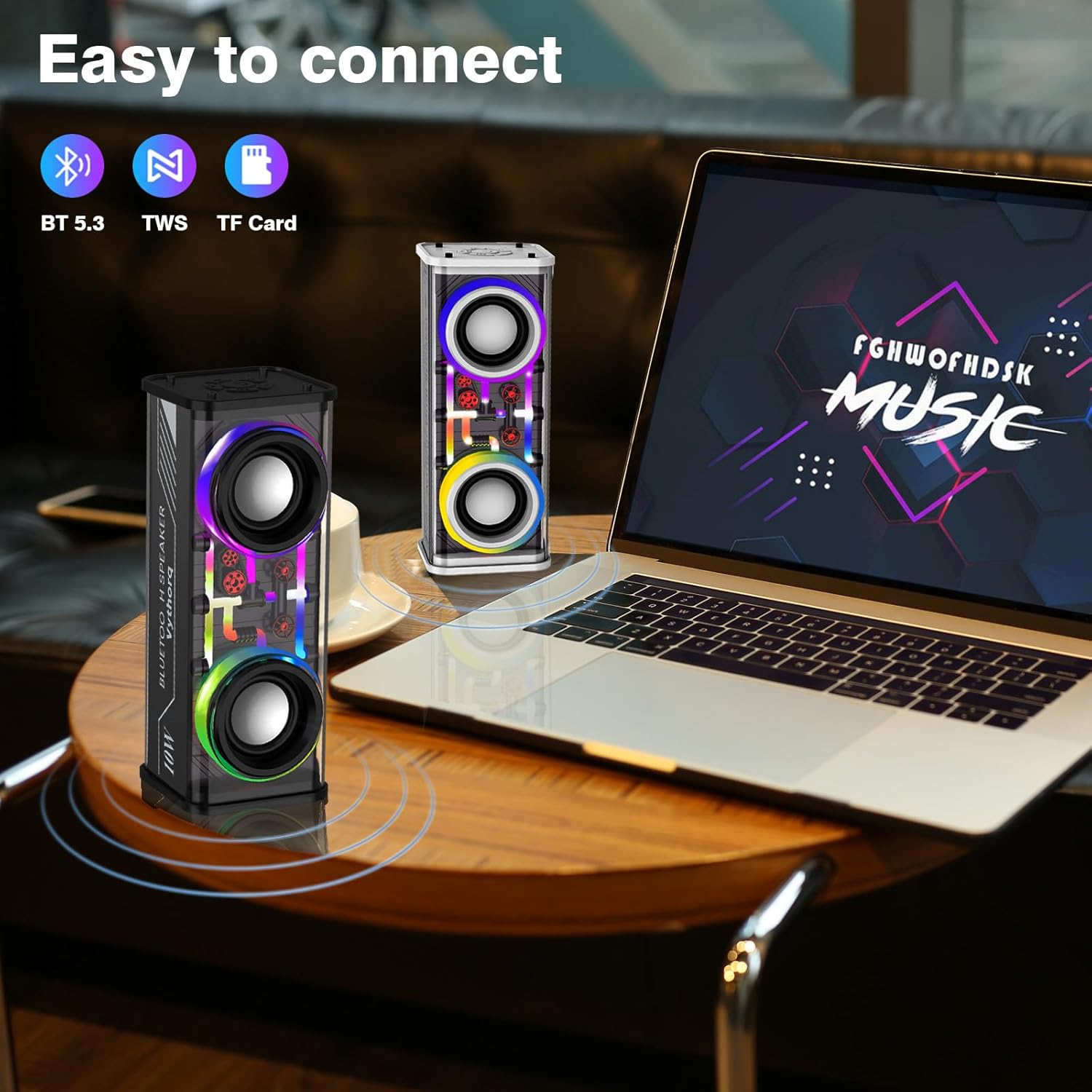 přenosný Bluetooth reproduktor s LED světly připojený k notebooku, TWS, Bluetooth 5.3, moderní design.